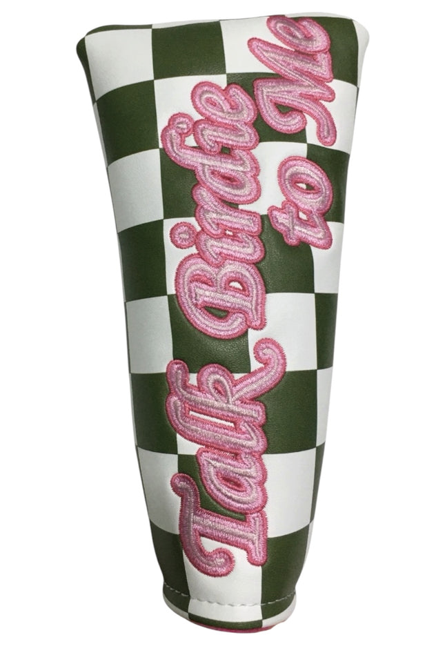 Checkered golf club head cover with pink text on a white background