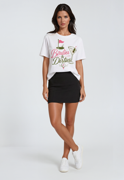 Woman wearing a white t-shirt with Birdies and dirties text and graphics on a plain background