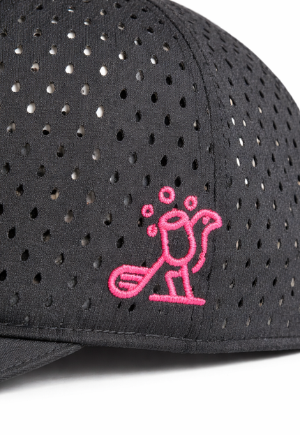 Close-up side view of Birdies & Bubbles women's black performance golf hat featuring pink embroidered golfer logo and breathable perforated fabric panels