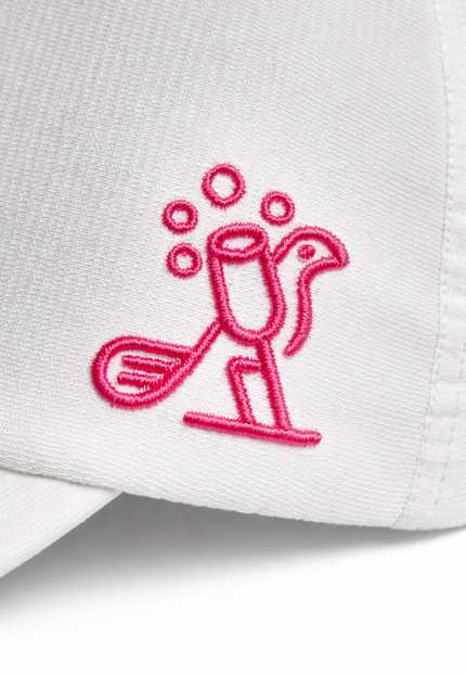 White cap with a pink embroidered flamingo design on a white background