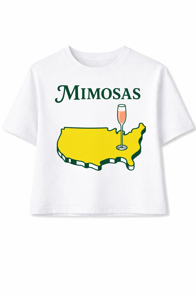 White t-shirt with 'Mimosas' text and a map of the United States with a champagne glass graphic on a white background.