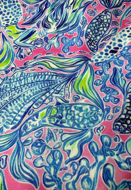 fairway-favorite-womens-golf-dress close up of print with the pink, blue and green pattern 