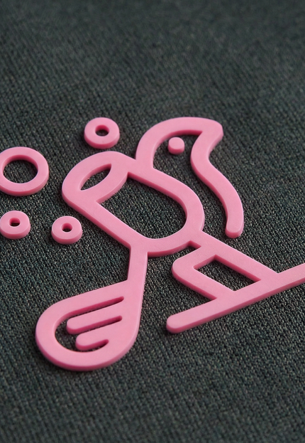 Pink logo on a black background